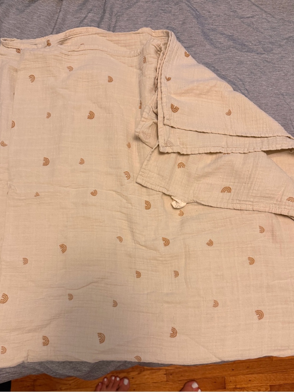 Mushie Neutral Cream Muslin receiving blanket/ swaddle  with Tan Rainbow Print